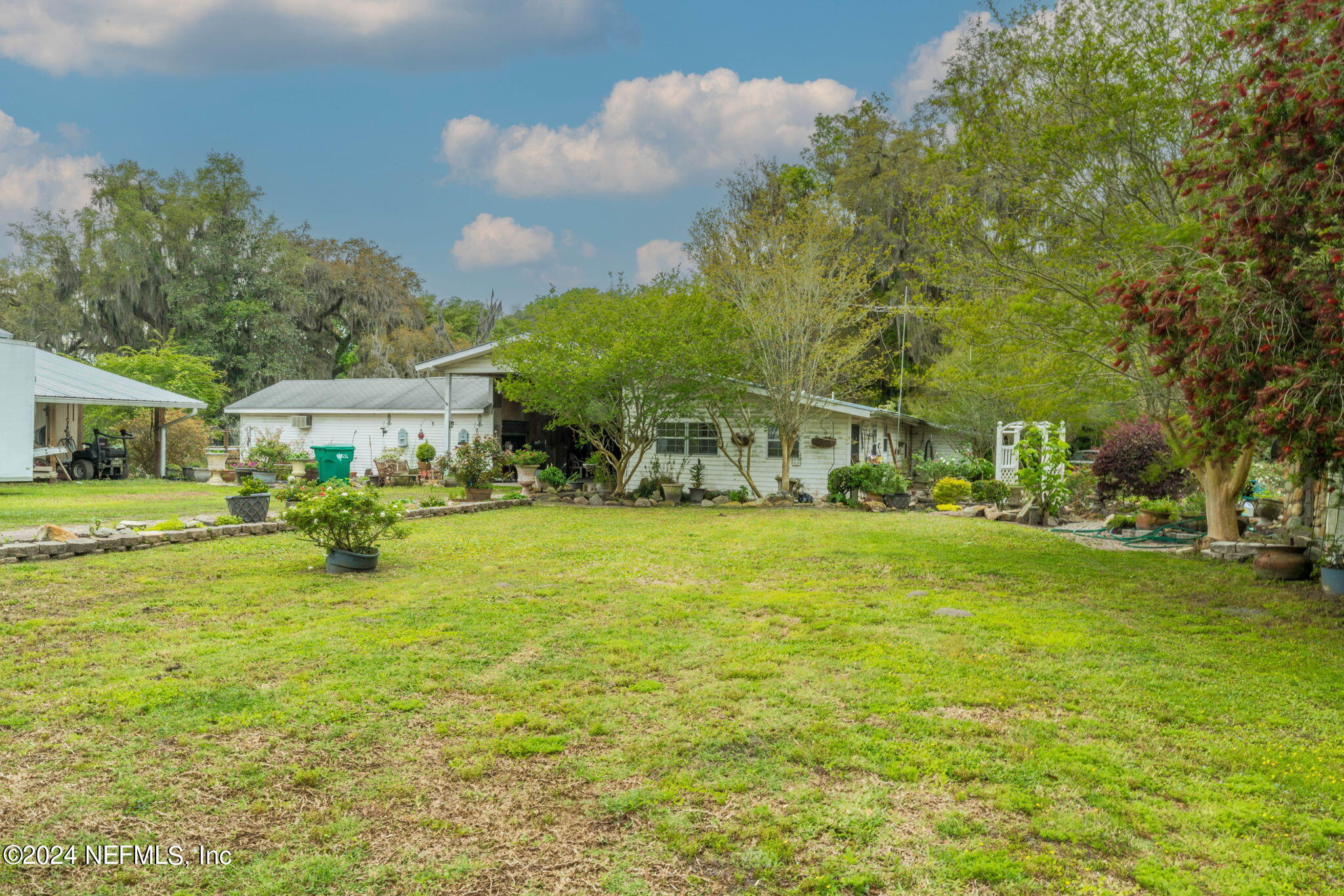 542284 Lem Turner Road Callahan, FL 32011 - Photo 76 of 84 a view of a house with a big yard