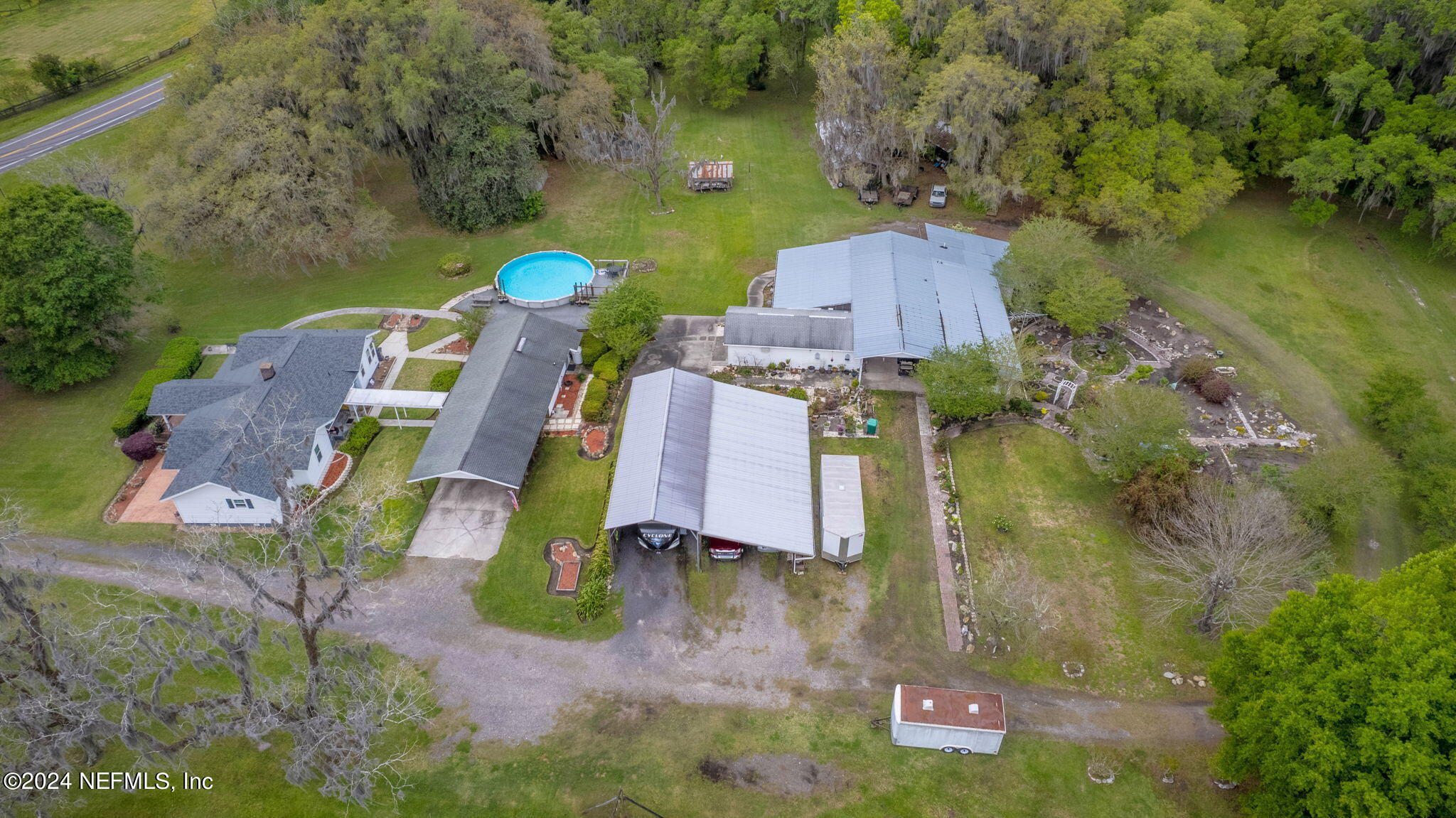 542284 Lem Turner Road Callahan, FL 32011 - Photo 82 of 84 an aerial view of residential house with outdoor space and swimming pool