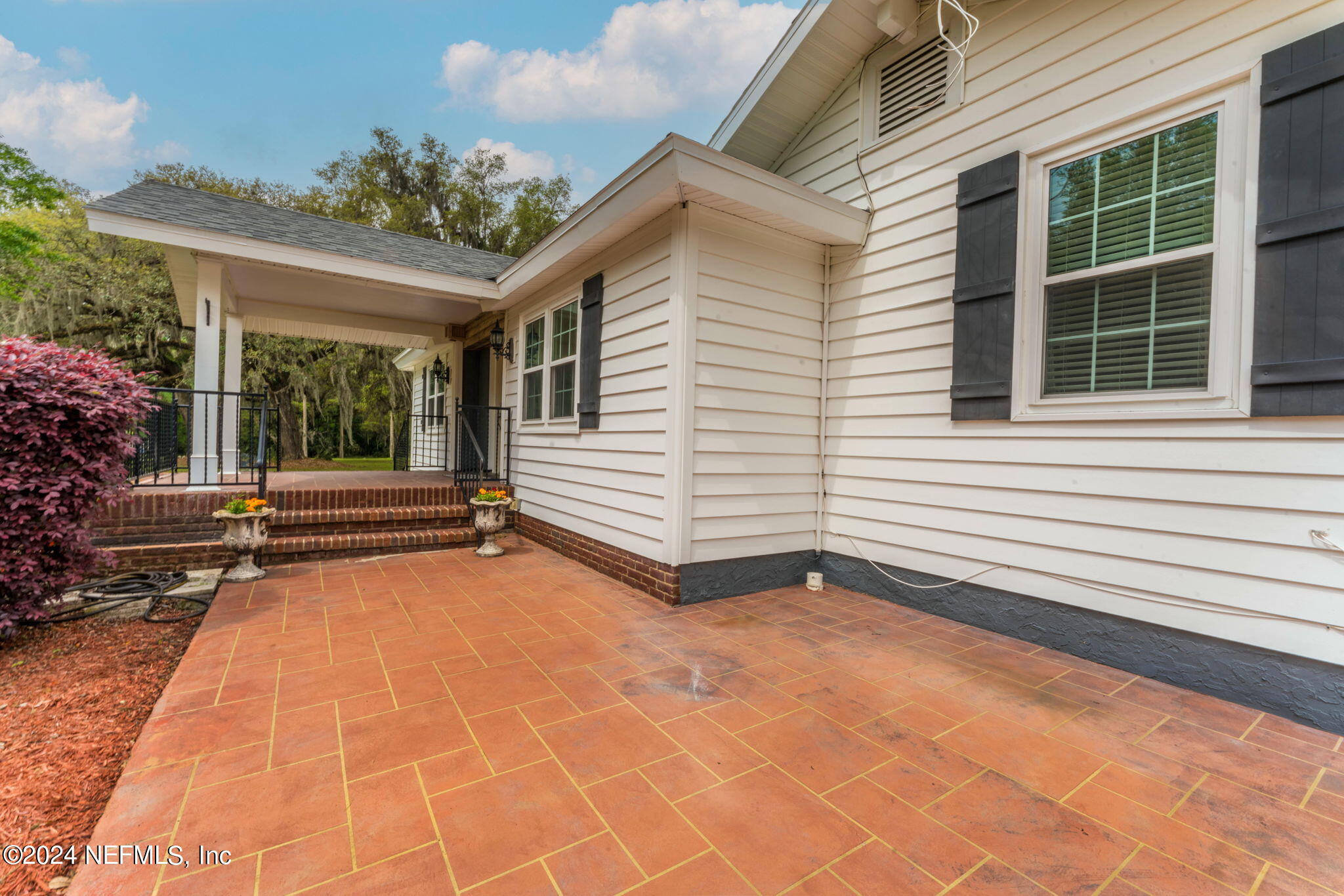 542284 Lem Turner Road Callahan, FL 32011 - Photo 83 of 84 a view of a house with a backyard