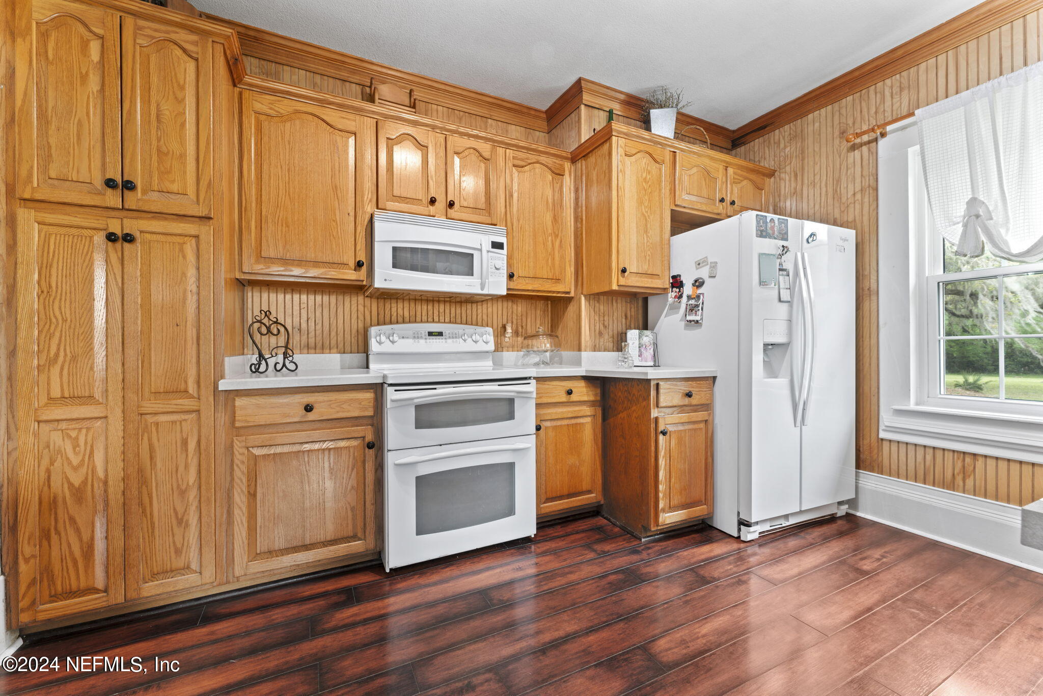 542284 Lem Turner Road Callahan, FL 32011 - Photo 10 of 84 a kitchen with stainless steel appliances a refrigerator stove and sink
