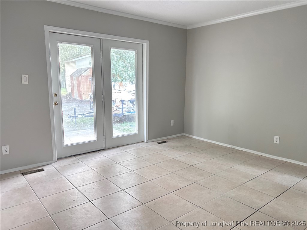 551 Alleghany Road Fayetteville, NC 28304 - Photo 3 of 13 a view of an empty room with a window
