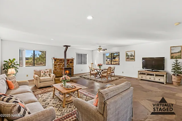 a view of a kitchen with stove and cabinets