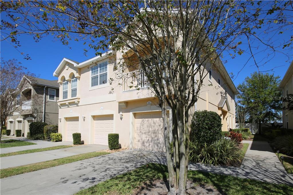 8828 Moonlit Meadows Loop Riverview, FL 33578 - Photo 1 of 1 a front view of a house with a yard