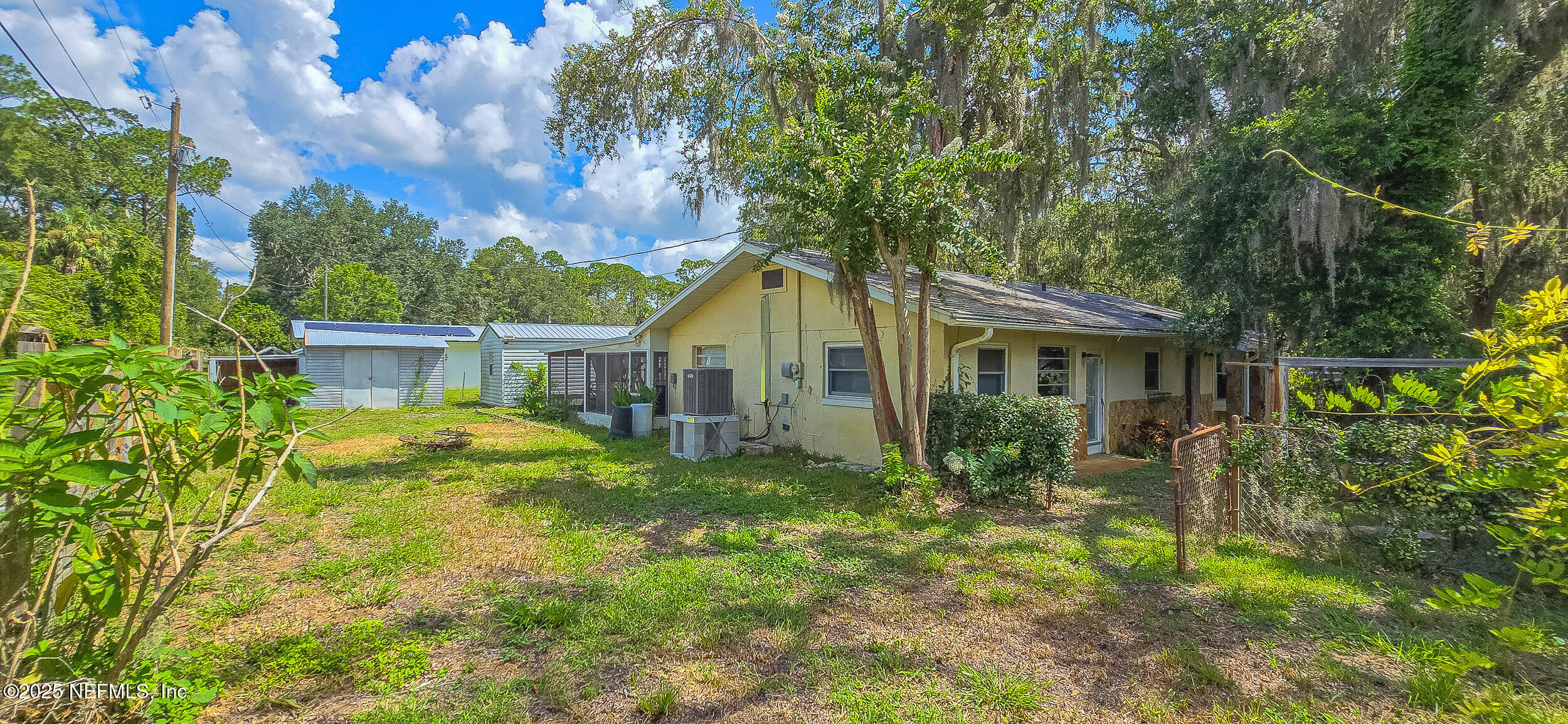 5 55th Street Yankeetown, FL 34498 - Photo 19 of 24 a view of a house with backyard and sitting area