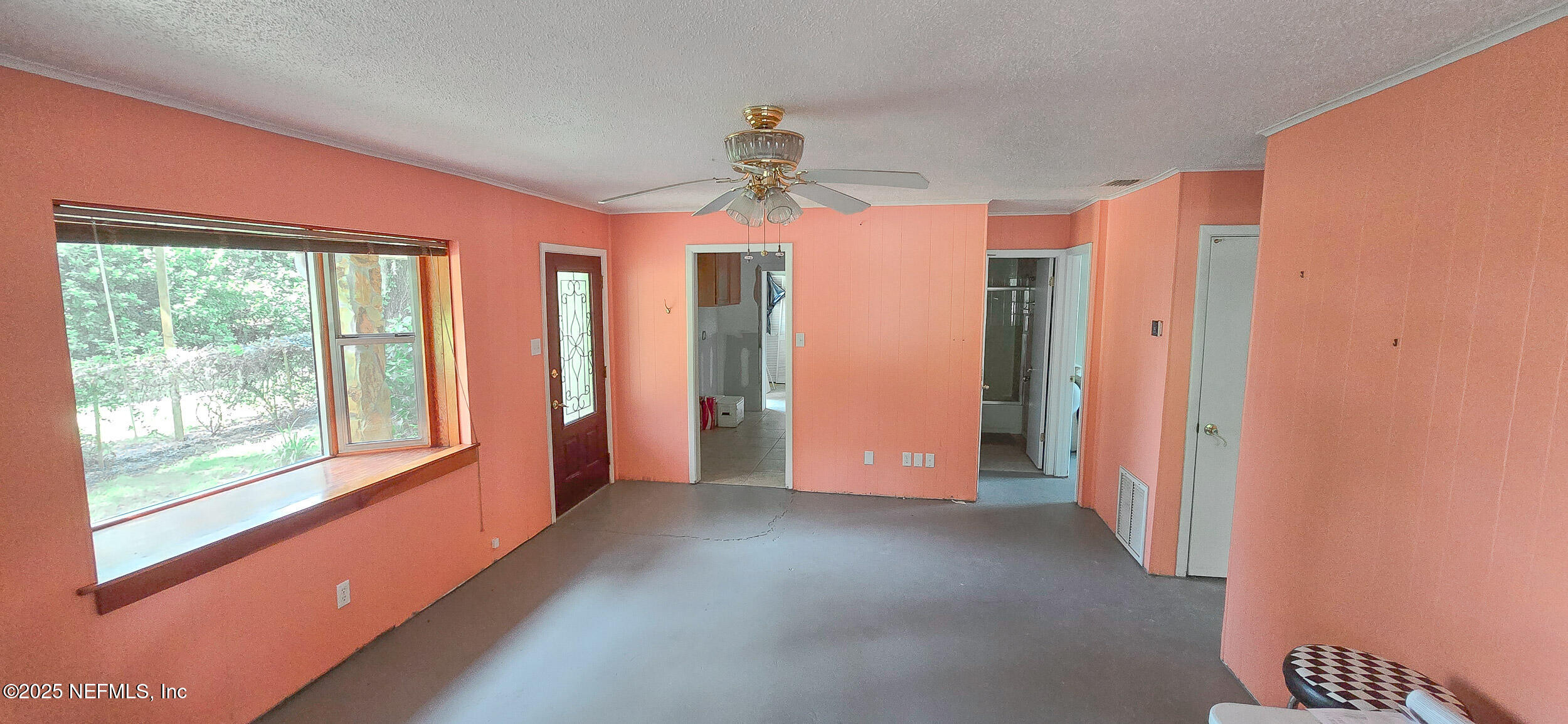 5 55th Street Yankeetown, FL 34498 - Photo 4 of 24 a view of a room with window chandelier