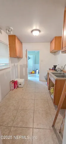 a bedroom with a bed and a cabinets