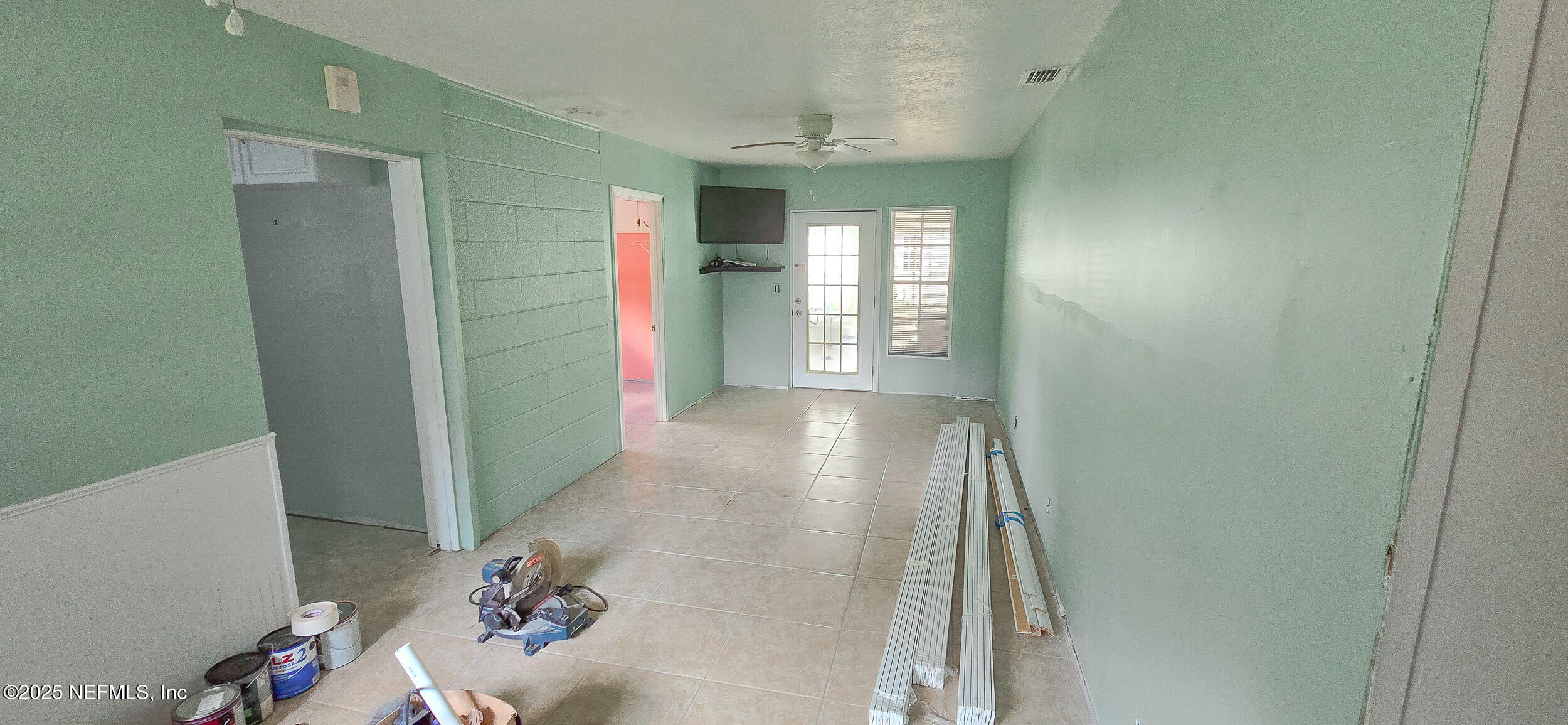 5 55th Street Yankeetown, FL 34498 - Photo 7 of 24 a view of entryway with window and wooden floor