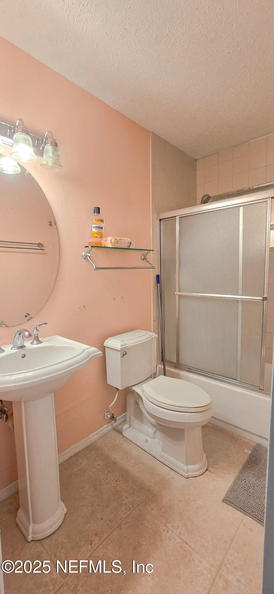 5 55th Street Yankeetown, FL 34498 - Photo 10 of 24 a bathroom with a toilet a sink and a mirror