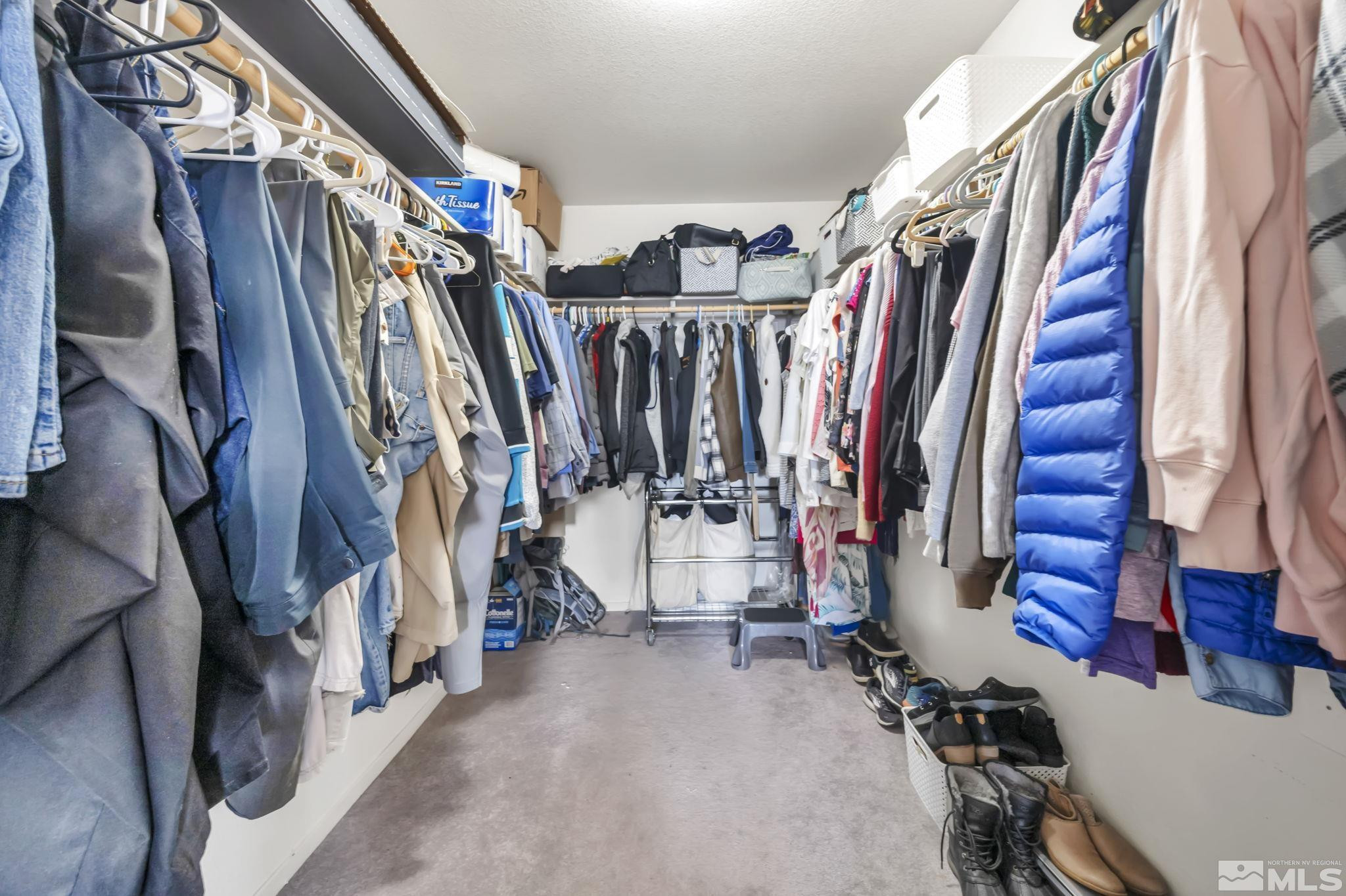 17795 Oakview Court Reno, NV 89508 - Photo 16 of 34 a view of walk in closet with clothes and shoes