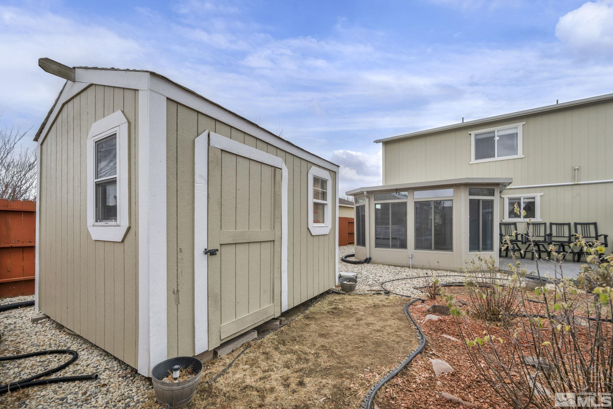17795 Oakview Court Reno, NV 89508 - Photo 30 of 34 a front view of a house with yard