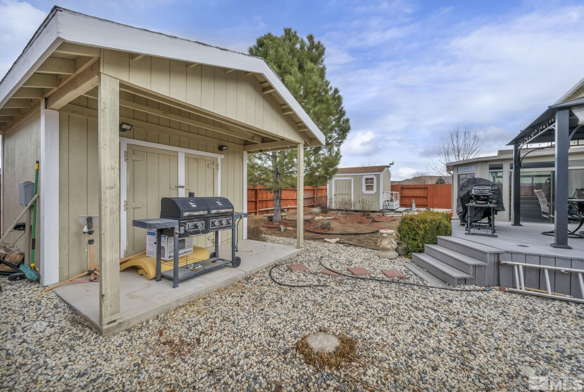 17795 Oakview Court Reno, NV 89508 - Photo 31 of 34 a view of a house with backyard porch and sitting area