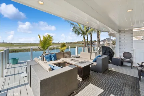 a view of a terrace with furniture