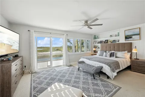a spacious bathroom with a double vanity sink and a mirror