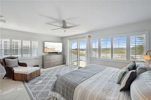 a view of a balcony with furniture