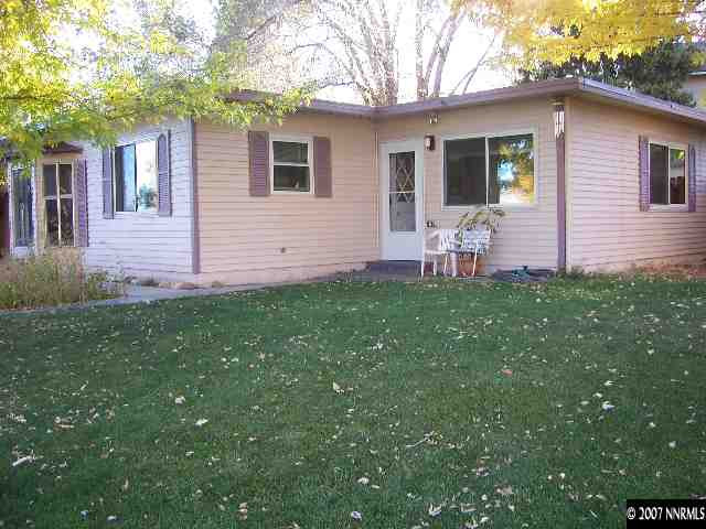 1685 Jackson Place Reno, NV 89512 - Photo 2 of 9 a view of a house with a backyard