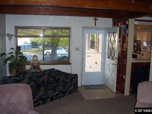 1685 Jackson Place Reno, NV 89512 - Photo 5 of 9 a living room with furniture and a potted plant