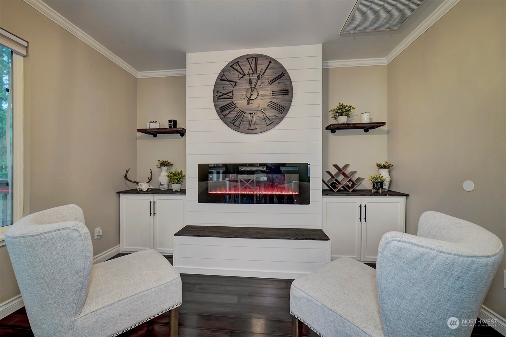 2016 Southeast Cedar Road Port Orchard, WA 98367 - Photo 13 of 30 a living room with furniture and a wall painting