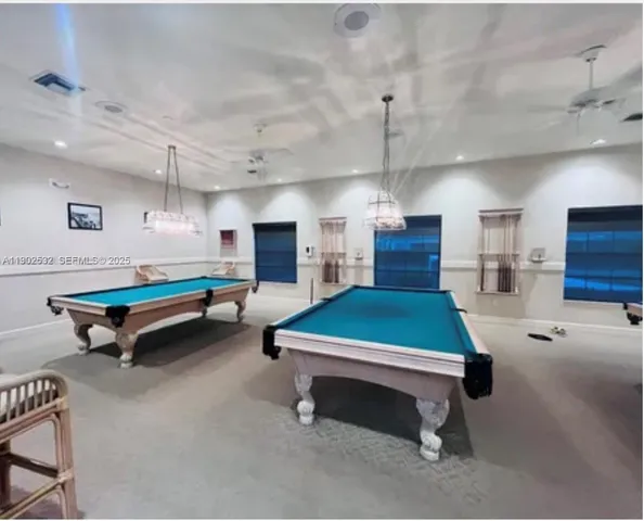 a view of a lake with a house