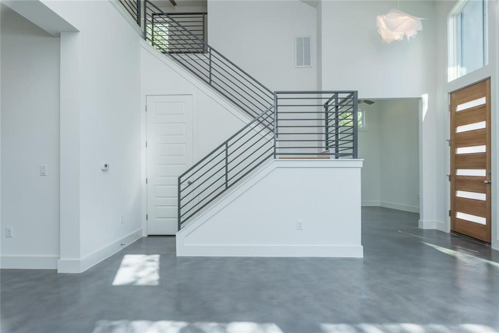 1403 Arcadia Avenue, Unit A Austin, TX 78757 - Photo 2 of 35 a view of entryway and hall with wooden floor