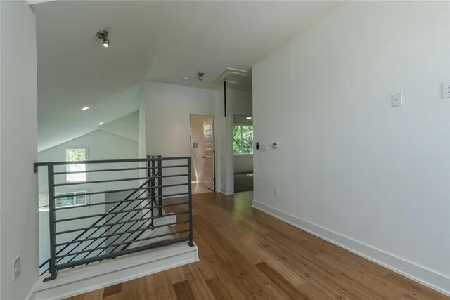 a view of entryway with wooden floor