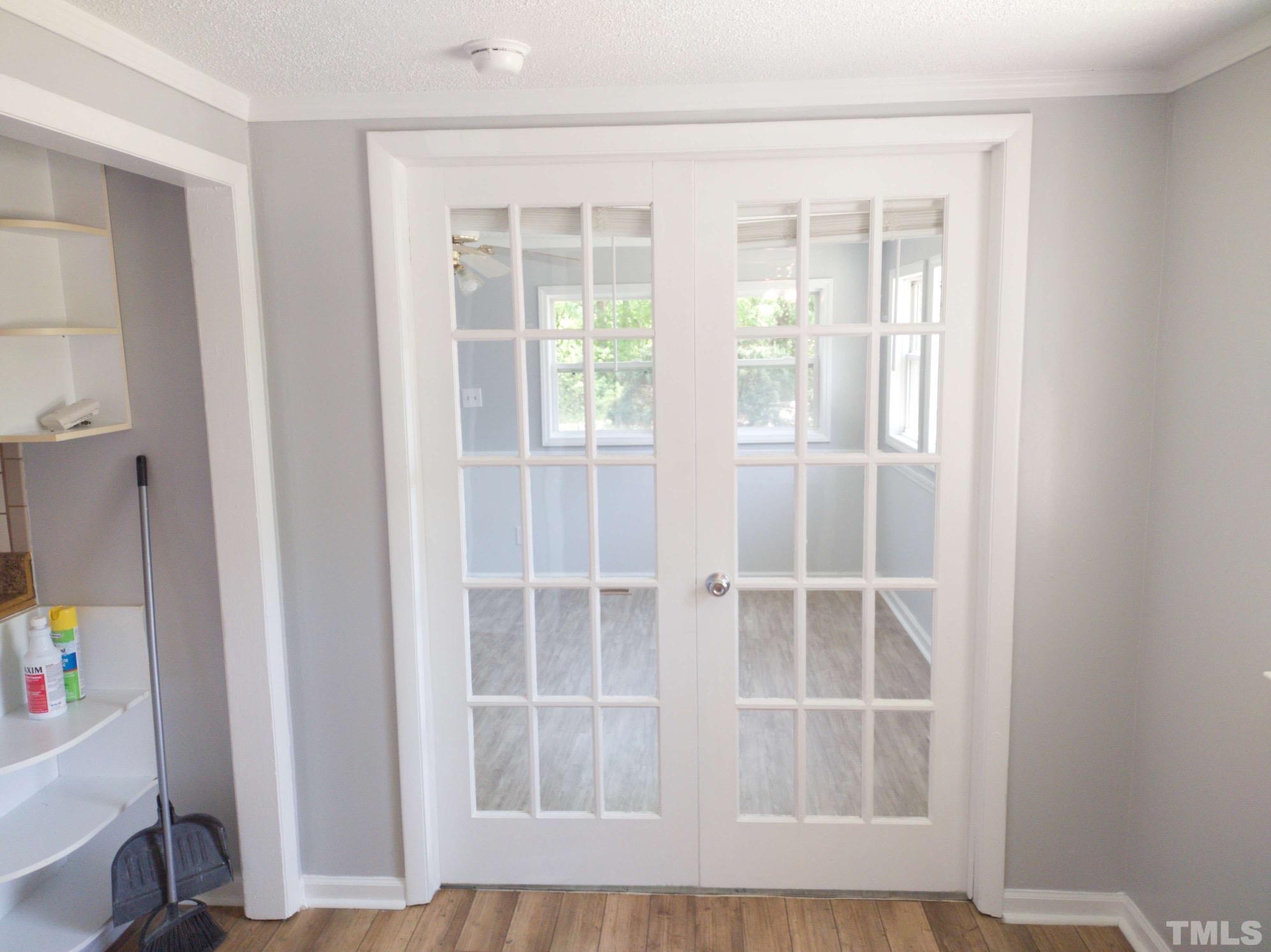 563 Williams Road Spring Hope, NC 27882 - Photo 15 of 16 a view of wooden floor and windows in a room