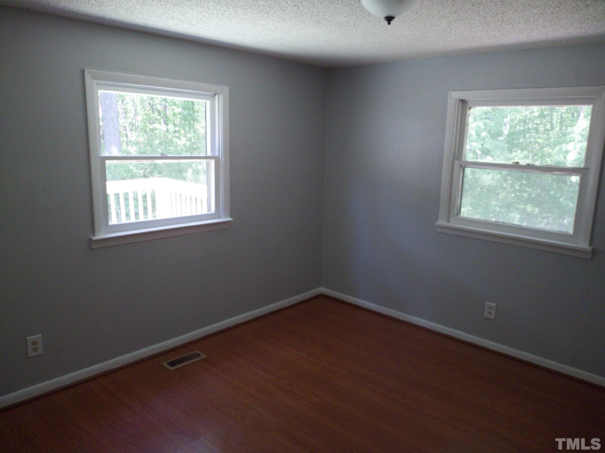 563 Williams Road Spring Hope, NC 27882 - Photo 8 of 16 an empty room with a window
