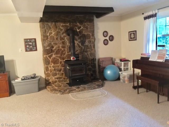 4221 Beckerdite Road Sophia, NC 27350 - Photo 11 of 28 Den with Wood Stove