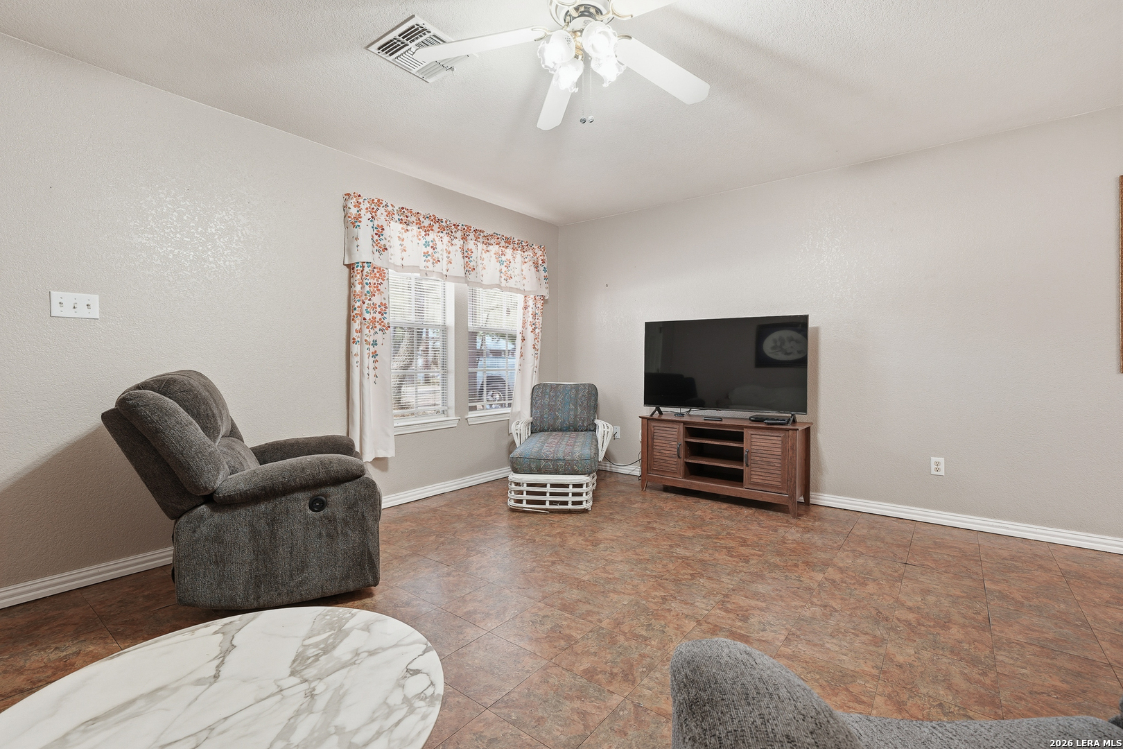 514 North 6th Street Fulton, TX 78358 - Photo 13 of 34 a living room with furniture and a flat screen tv