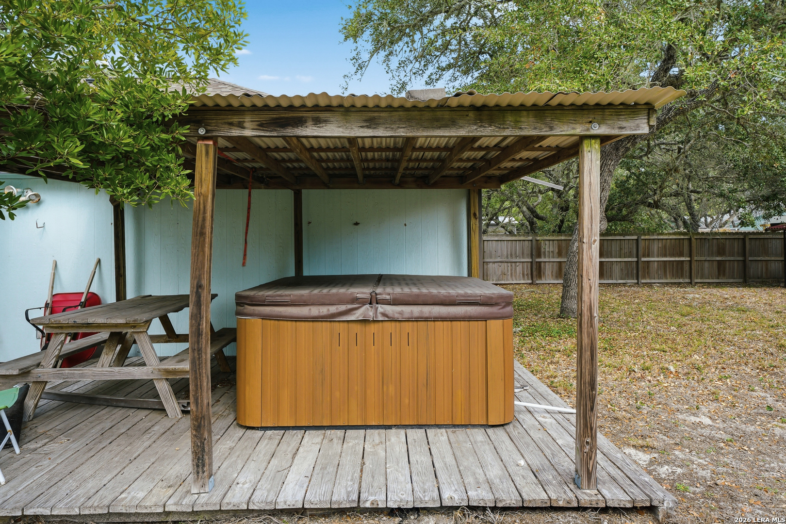 514 North 6th Street Fulton, TX 78358 - Photo 14 of 34 a backyard of a house with table and chairs