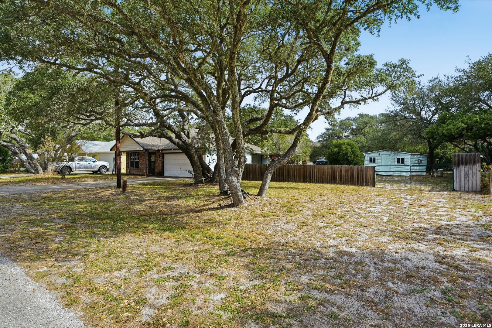 514 North 6th Street Fulton, TX 78358 - Photo 26 of 34 a house with trees in the background