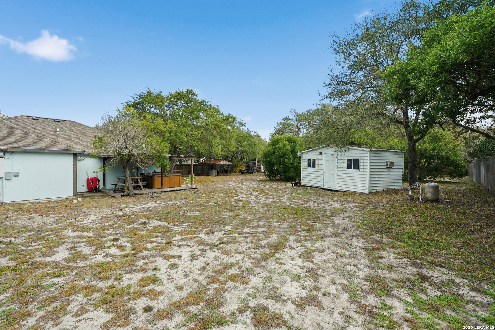 514 North 6th Street Fulton, TX 78358 - Photo 30 of 34 a view of a house with a yard and a tree