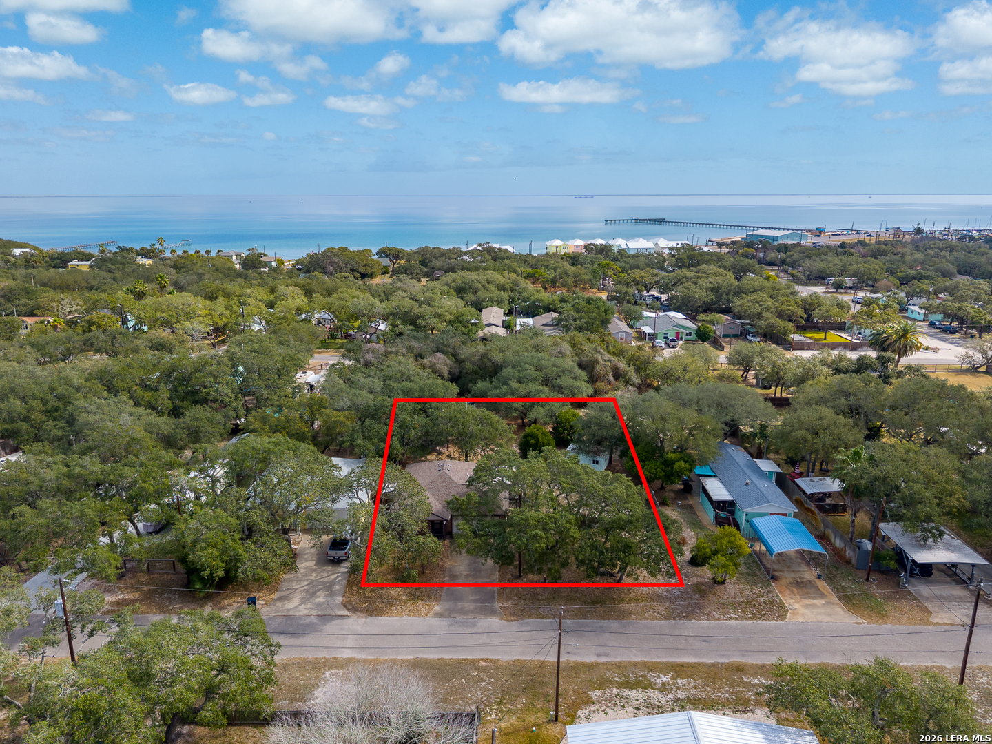 514 North 6th Street Fulton, TX 78358 - Photo 33 of 34 an aerial view of a city with lots of residential buildings