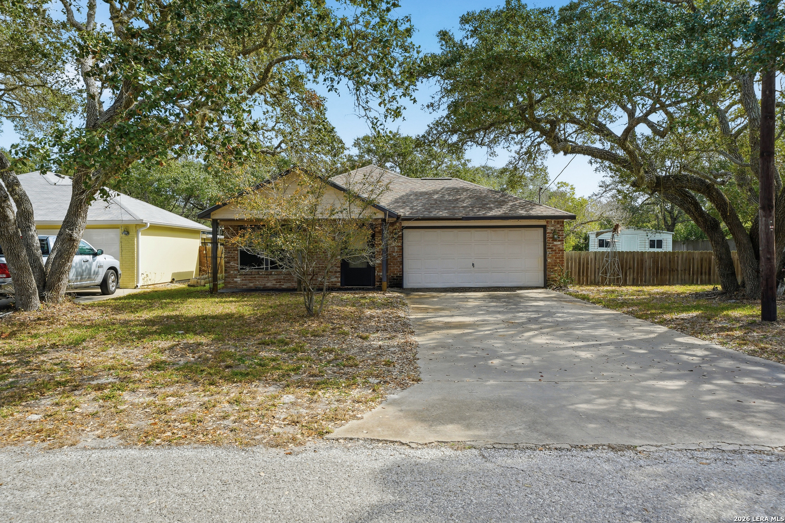 514 North 6th Street Fulton, TX 78358 - Photo 5 of 34 a front view of a house with a garden