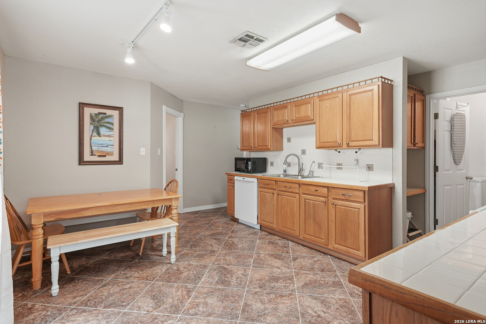 514 North 6th Street Fulton, TX 78358 - Photo 8 of 34 a spacious bathroom with a sink a mirror and a bathtub