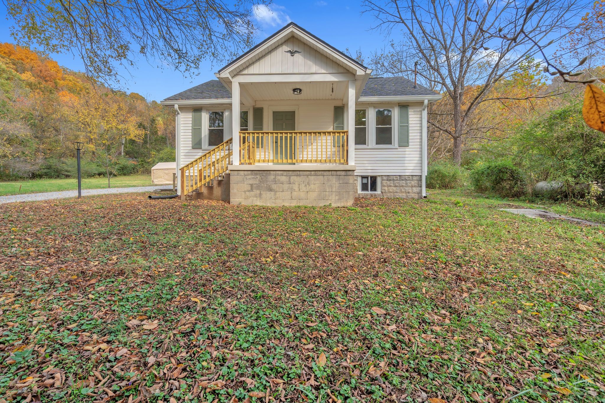 5060 Drakes Branch Road Nashville, TN 37218 - Photo 1 of 43 a front view of a house with a yard