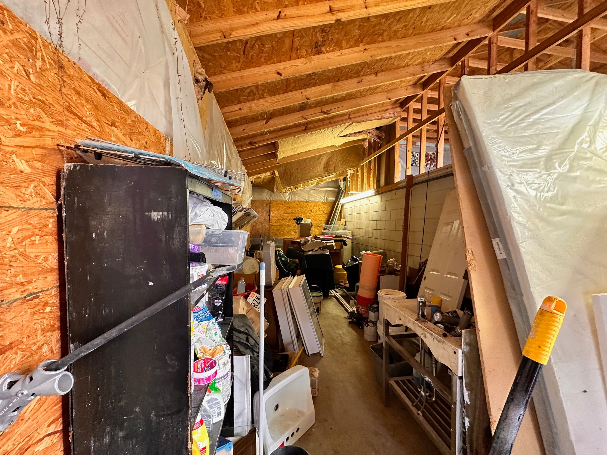 5060 Drakes Branch Road Nashville, TN 37218 - Photo 30 of 43 a view of walk in closet with clothes and shoes