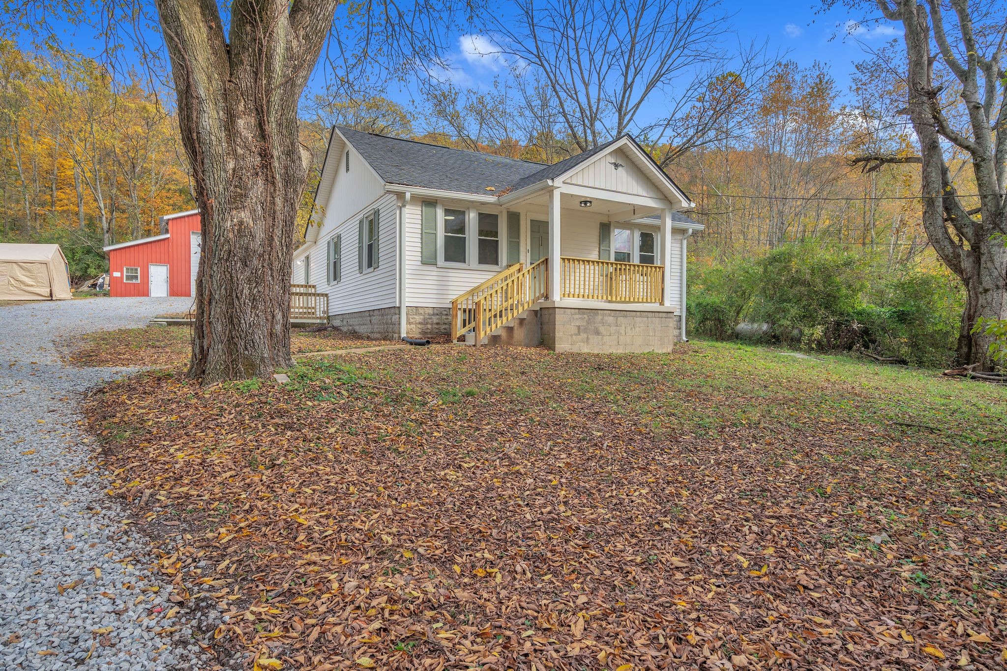 5060 Drakes Branch Road Nashville, TN 37218 - Photo 34 of 43 a front view of a house with a garden