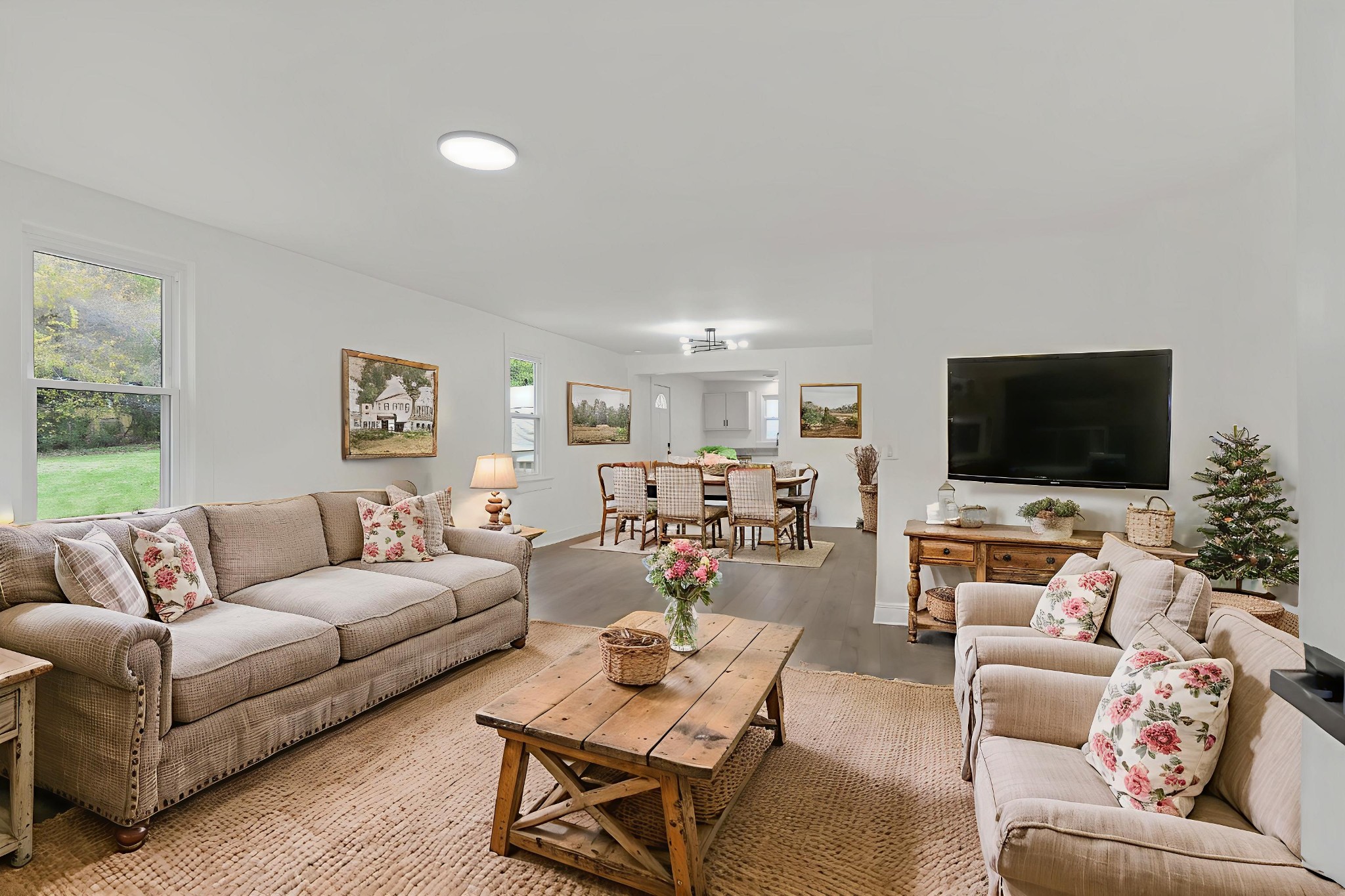 5060 Drakes Branch Road Nashville, TN 37218 - Photo 5 of 43 a living room with furniture and a flat screen tv
