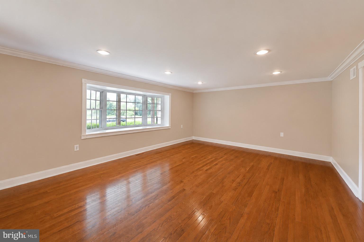 715 Bucks Road Perkasie, PA 18944 - Photo 19 of 55 Living Room with Newer Hw Flrs AI Wall Paint Color