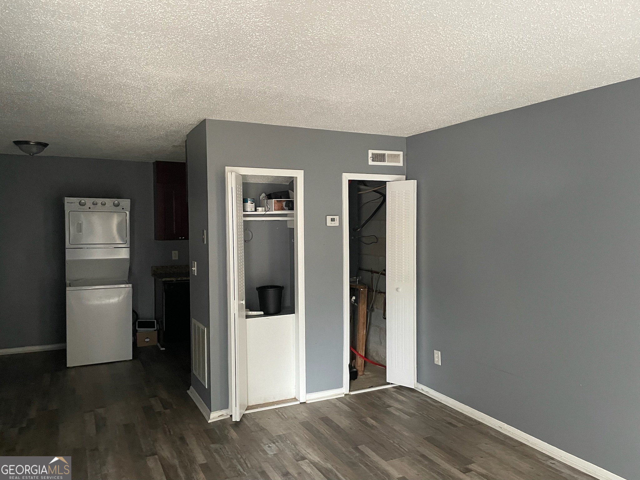 4701 Flat Shoals Road, Unit 25F Union City, GA 30291 - Photo 2 of 21 a view of an empty room with wooden floor and closet