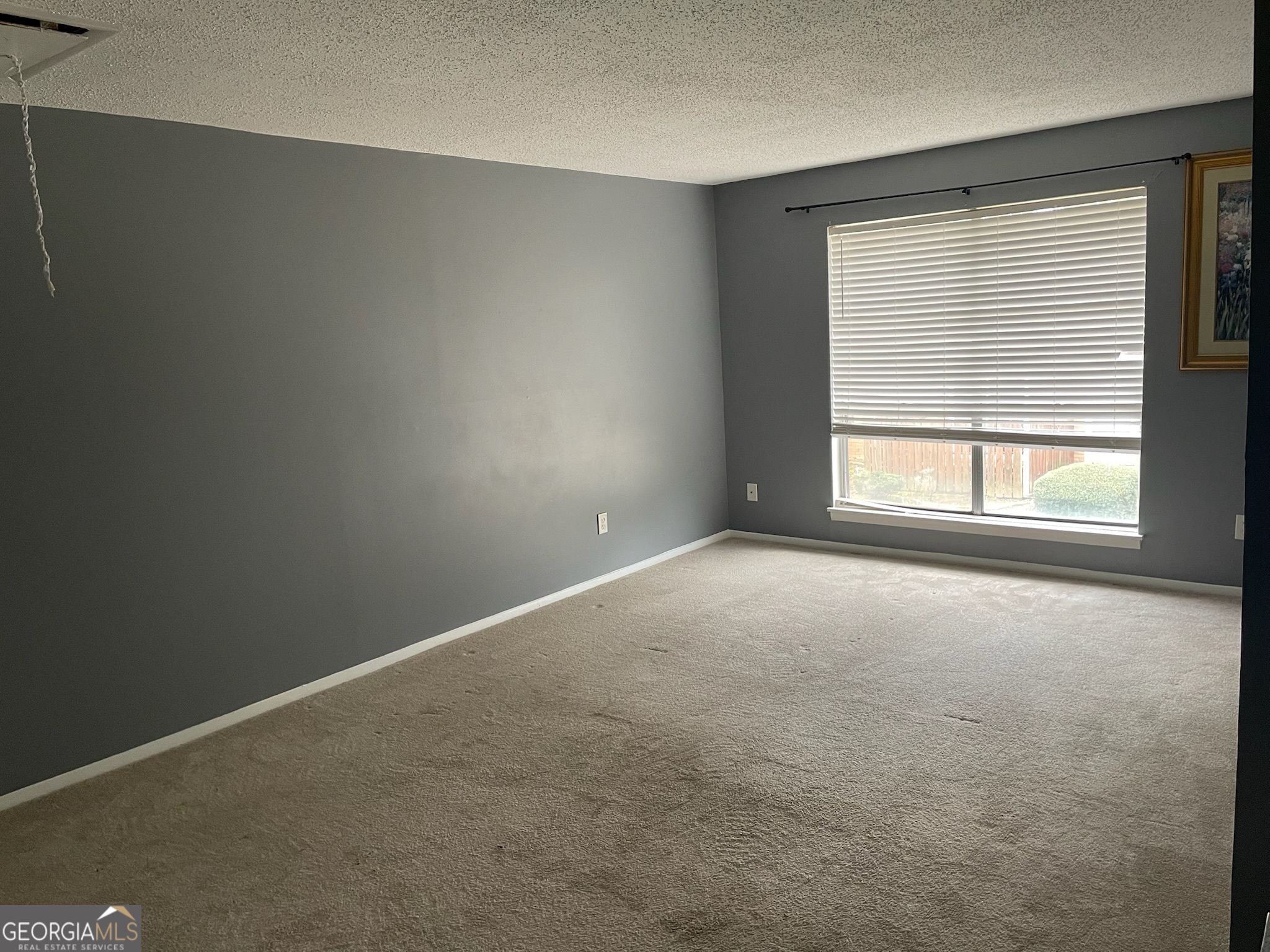 4701 Flat Shoals Road, Unit 25F Union City, GA 30291 - Photo 9 of 21 an empty room with a window