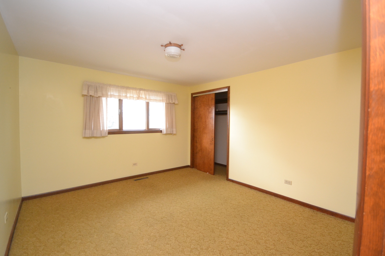 42W665 Plato Road Elgin, IL 60124 - Photo 19 of 38 a view of an empty room with a window