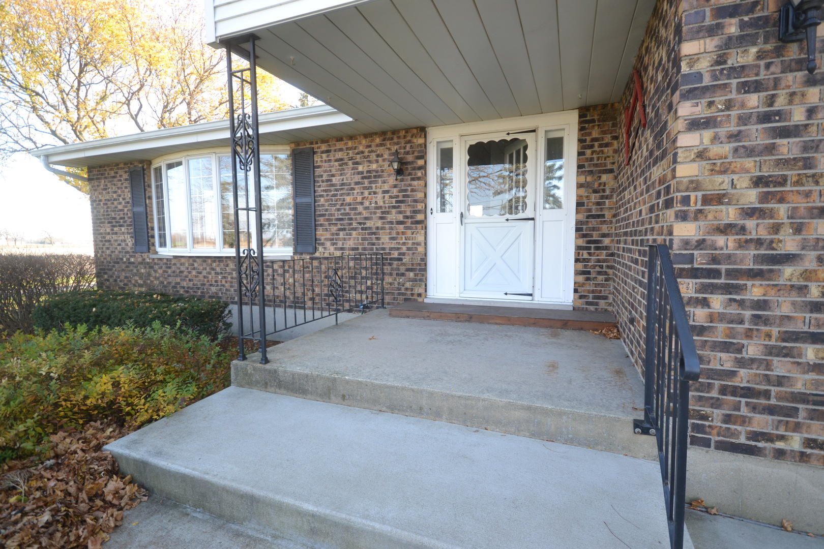 42W665 Plato Road Elgin, IL 60124 - Photo 32 of 38 a front view of a house with a yard