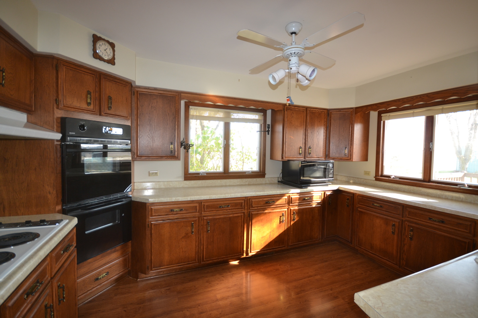 42W665 Plato Road Elgin, IL 60124 - Photo 6 of 38 a large kitchen with cabinets stove and refrigerator