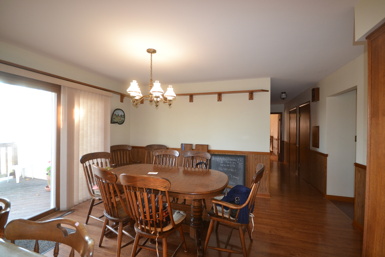 42W665 Plato Road Elgin, IL 60124 - Photo 8 of 38 a dining room with furniture a chandelier and wooden floor