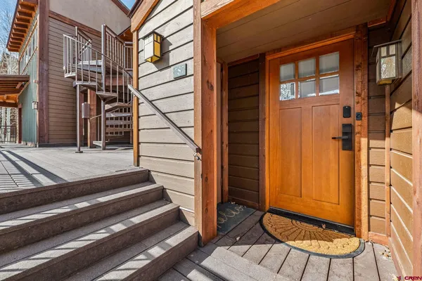 a view of entryway with a front door