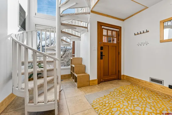 a view of an entryway with staircase