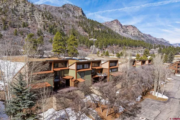 a view of a terrace with sitting area