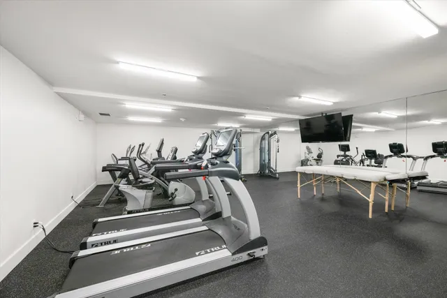 a view of a room with gym equipment