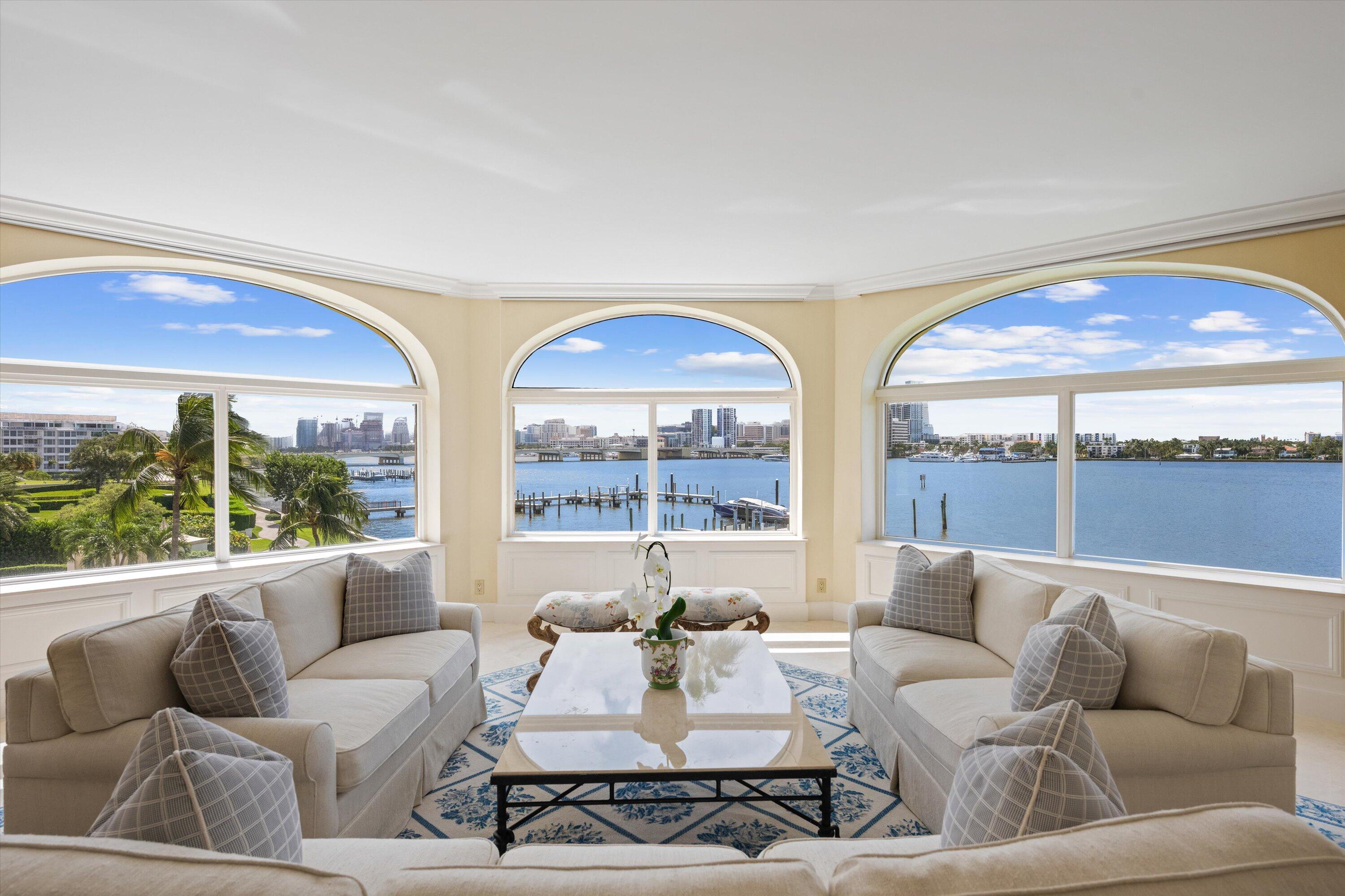 200 Bradley Place, Unit 303 Palm Beach, FL 33480 - Photo 5 of 40 a living room with furniture and a large window